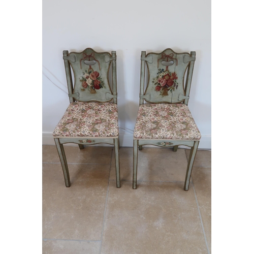 643 - A pair of painted and decorated side/bedroom chairs