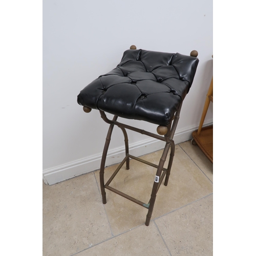 653 - A metal framed high stool with black button cushion seat - Height 89cm x Depth 49cm x Width 34cm - i... 