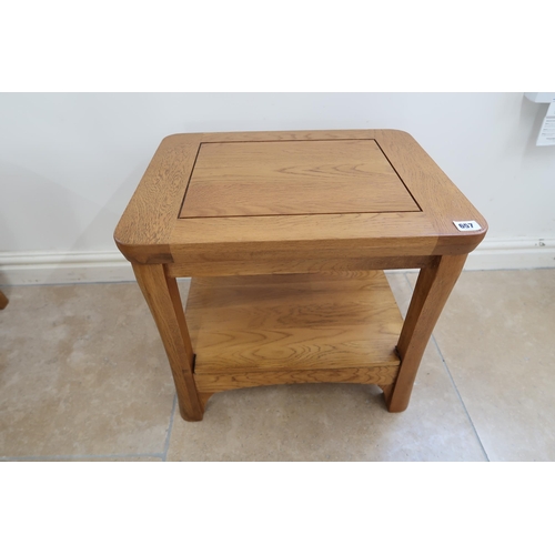 657 - Three modern oak side tables