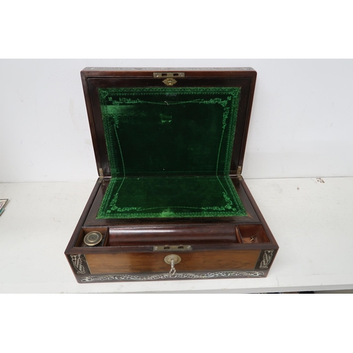 682 - A 19th century rosewood writing box with mother of pearl inlay