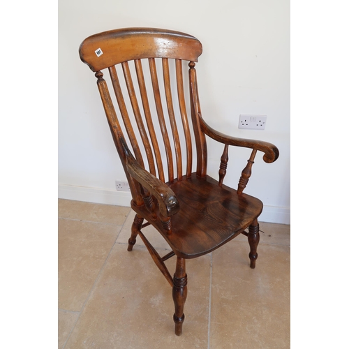 691 - A 19th century slat back Windsor chair on turned legs