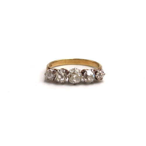 9 - An old cut diamond graduated five stone ring. Estimated total diamond weight 1.50cts. Estimated I/J ... 