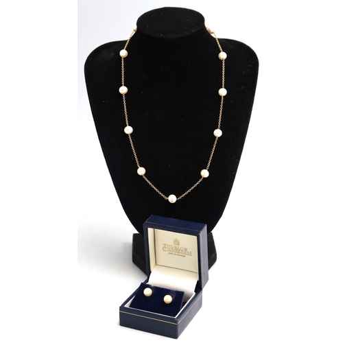 94 - An 18ct yellow gold marked necklace 38cm long interspersed with Peals along with a pair of Pearl stu... 