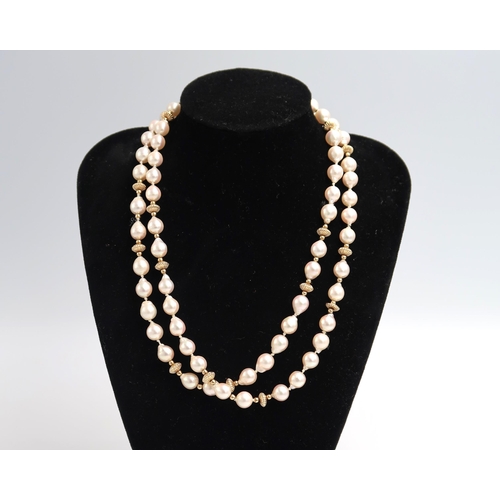 95 - A Takara Pearl necklace Japanese cultured Pearls 76cm long, Boxed in good condition.