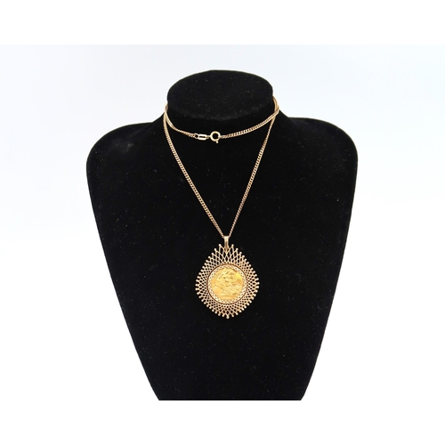 148 - A 1911 half sovereign held in a 9ct yellow gold pendant suspended on a 9ct yellow gold chain - appro... 