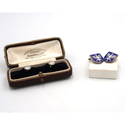 160 - A pair of 18ct stamped white gold cufflinks of octagonal design with pearl and mother of pearl to ce... 