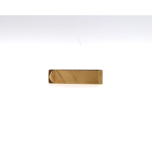 201 - A 9ct gold hallmarked yellow gold money clip - approx weight 8.5 grams - clean and bright