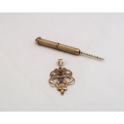 205 - A tested 9ct yellow gold pendant set with seed pearls and a 9ct gold hallmarked propelling toothpick... 