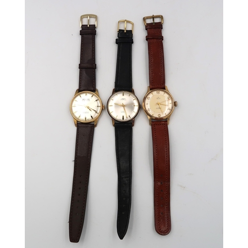 273 - A gold plated Smiths Delux gents watch 17 Jewel Shockproof movement, Arabic numerals at 12, 2, 4, 6,... 