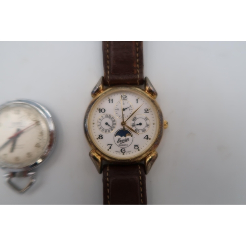 281 - A Lauris Nightingale nurses watch with suspension loop in steel case, Arabic numerals to silvered di... 