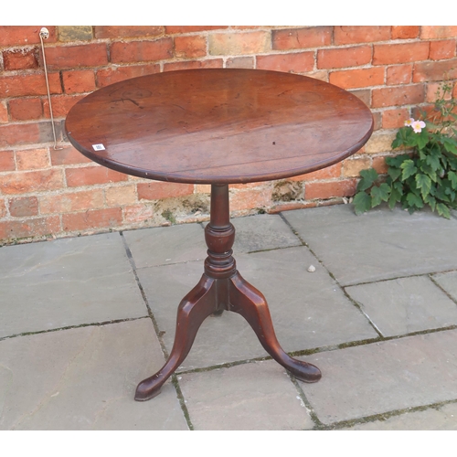 688 - A 19th century mahogany tilt top table with a birdcage action on a gun barrel base and three legs - ... 