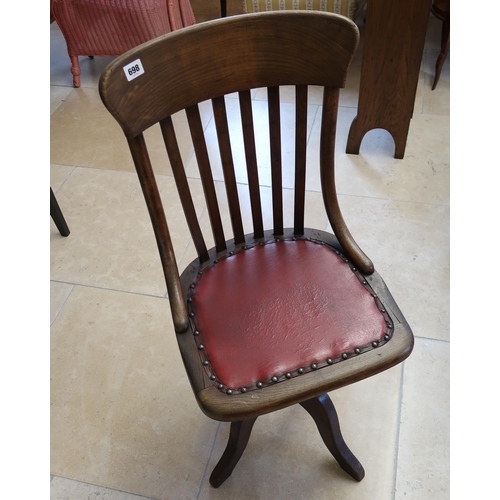 698 - A circa 1920s/30s oak swivel action desk/machinists chair - Height 92cm