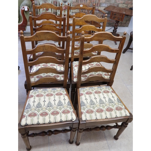 700 - A set of six mid 20th century oak ladder back dining chairs with drop in seats - Height 104cm x 45cm... 