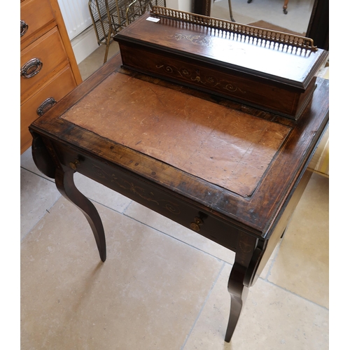 706 - A rosewood ladies writing desk - Gallery to top lifting to reveal stationary compartment above leath... 