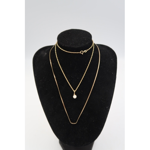 150 - A marked 9ct yellow gold necklace - 38cm in length - approx weight 2.2 grams and another marked 9ct ... 