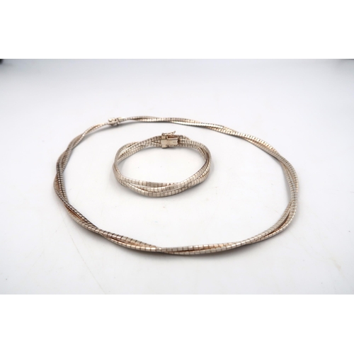 166 - A silver marked 925 necklace and bracelet - necklace 45cm long, bracelet 19cm long - approx total we... 