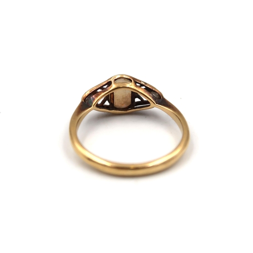 167 - An 18ct yellow gold hallmarked dress ring with oval opal to shoulder flanked by diamonds - ring size... 