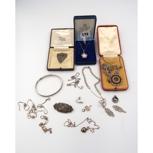 172 - A selection of silver and white metal costume jewellery including a circular shaped pendant suspende... 