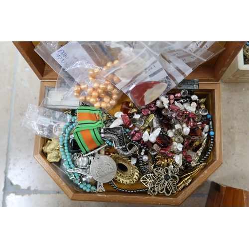 173 - Three boxes of costume jewellery - items include rings, beaded necklaces, brooches etc