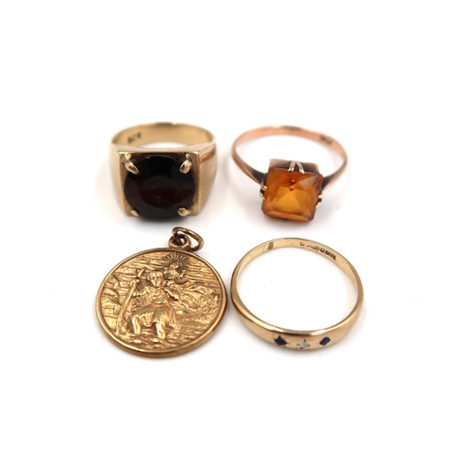 211 - Three 9ct gold marked dress rings sizes H/I, N & J - and a small marked 9ct yellow gold St Christoph... 