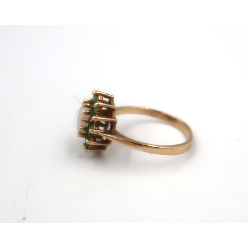 223 - A 9ct yellow gold dress cluster ring with green paste set around a central oval opal - ring size N -... 