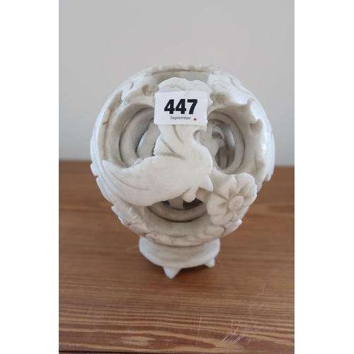 447 - A white jade six layer puzzle ball, 12cm in diameter, carved with bird, flowers and spray, in good c... 