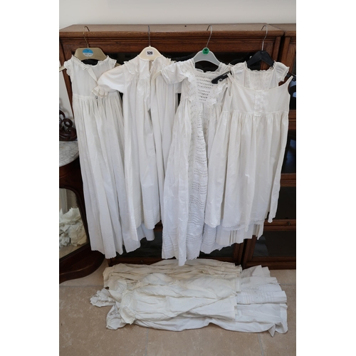 520 - A selection of eight children's Christening gowns, various sizes and designs