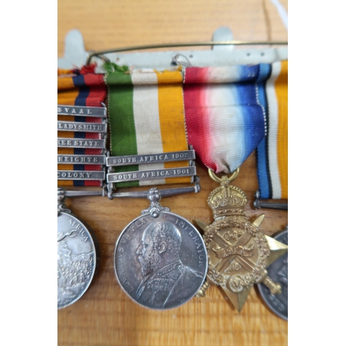 544 - A group of five medals including South Africa Campaign medal with clasps four Transvaal, Relief of L... 