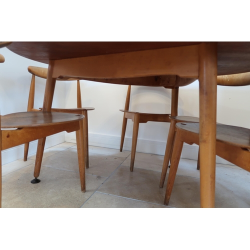 641 - A Hans J Wegner for Fritz Hansen circular dining table on three legs - Diameter 120cm - along with s... 