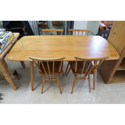 694 - An Ercol blonde table and four chairs - Width 75cm x Length 152cm x Height 72cm