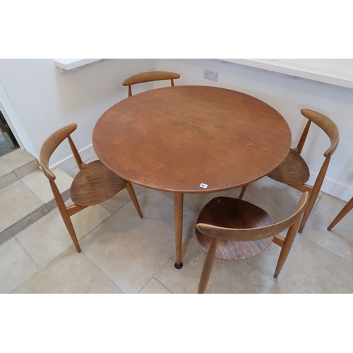 641 - A Hans J Wegner for Fritz Hansen circular dining table on three legs - Diameter 120cm - along with s... 