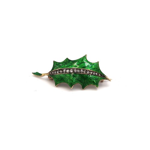 197 - A holly leaf shaped with green enamel ground with a central spine set with seventeen part cut 'chip'... 