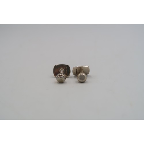 196 - A pair of hallmarked silver cufflinks with a boxed pair of Mont Blanc white metal cufflinks