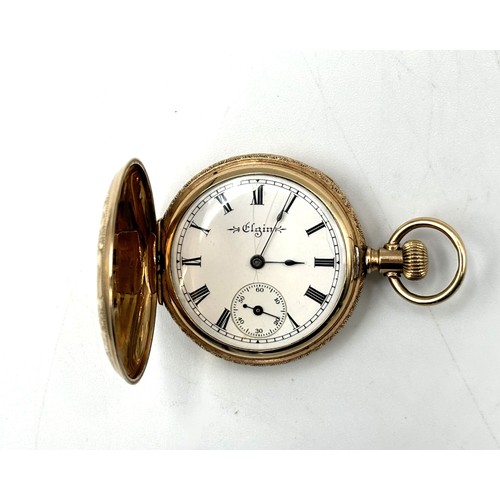 254 - An Elgin 10K marked cased pocket watch full Hunter with roman numerals to white enamel dial, subsidi... 