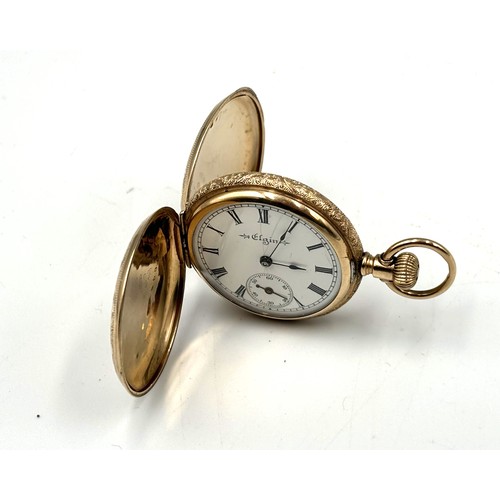 254 - An Elgin 10K marked cased pocket watch full Hunter with roman numerals to white enamel dial, subsidi... 