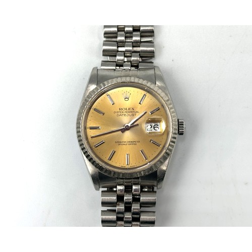 259 - A gents Rolex Datejust wristwatch with a Champagne coloured dial with date - 40mm dial and a Jubilee... 