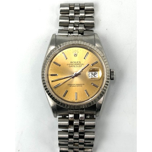 259 - A gents Rolex Datejust wristwatch with a Champagne coloured dial with date - 40mm dial and a Jubilee... 