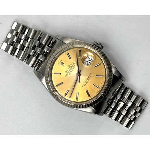 259 - A gents Rolex Datejust wristwatch with a Champagne coloured dial with date - 40mm dial and a Jubilee... 