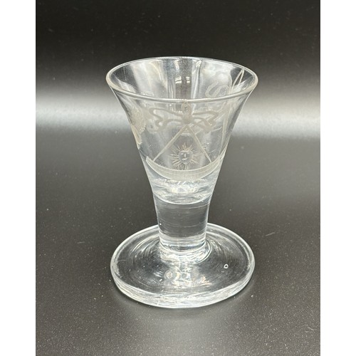 471 - An 18th century Masonic firing glass 10cm high (In good condition).