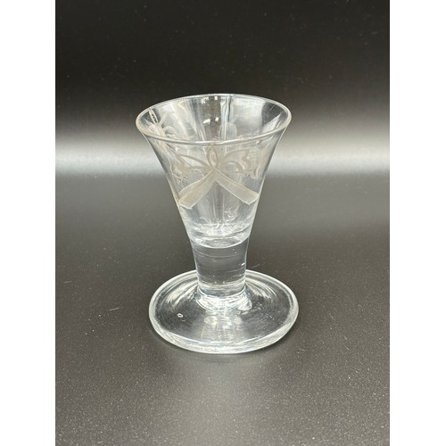 471 - An 18th century Masonic firing glass 10cm high (In good condition).