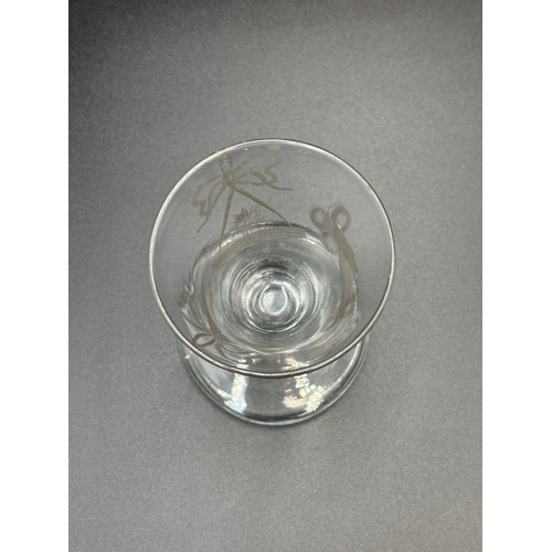 471 - An 18th century Masonic firing glass 10cm high (In good condition).