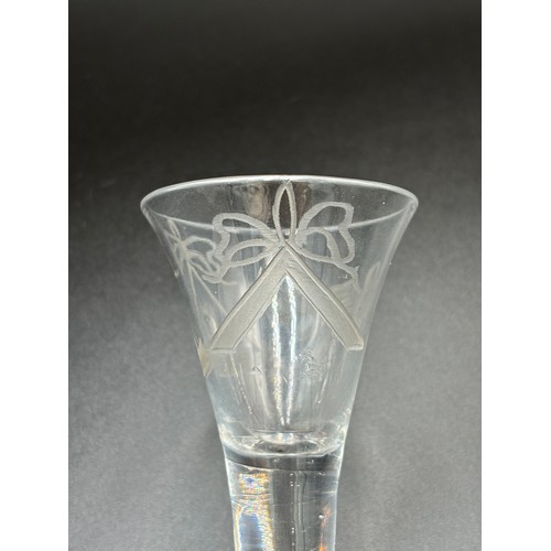 471 - An 18th century Masonic firing glass 10cm high (In good condition).