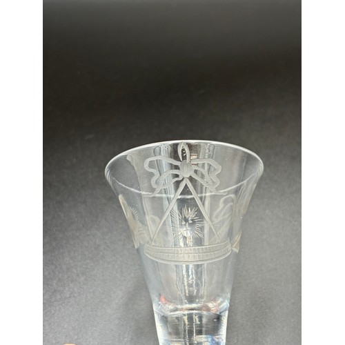 471 - An 18th century Masonic firing glass 10cm high (In good condition).