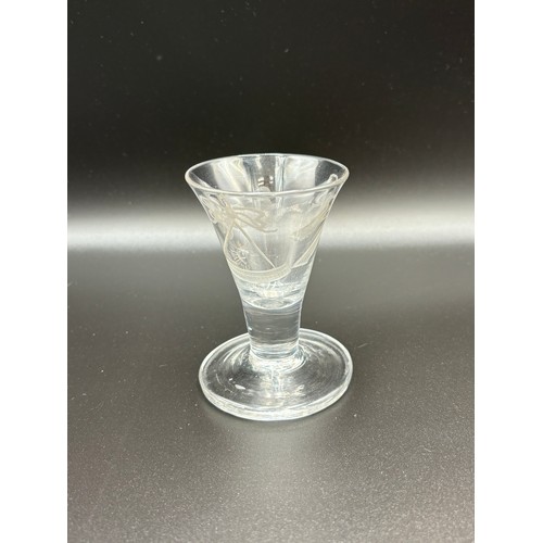 471 - An 18th century Masonic firing glass 10cm high (In good condition).