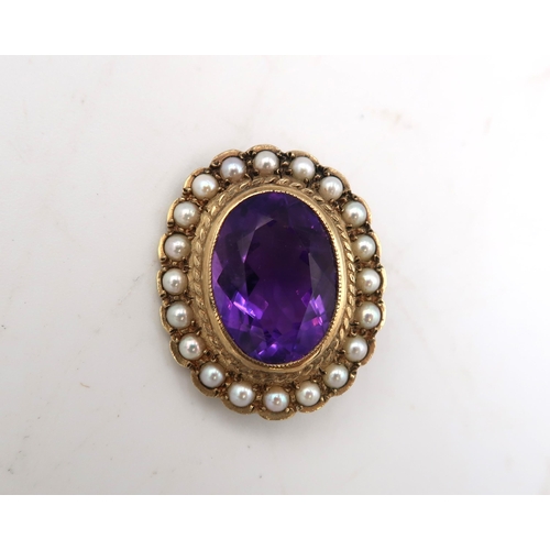  A hallmarked 9ct seed pearl and amethyst oval brooch, 8.9 grams