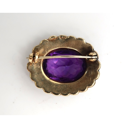  A hallmarked 9ct seed pearl and amethyst oval brooch, 8.9 grams