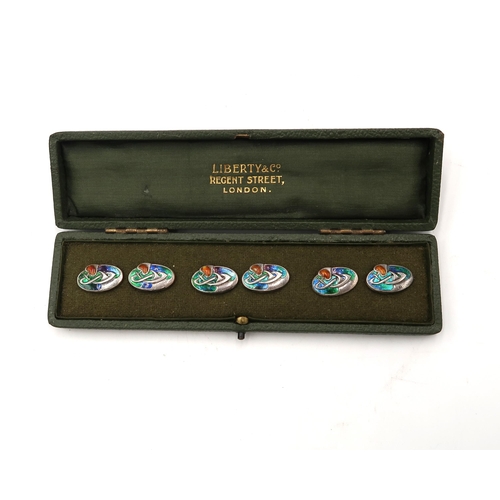  A set of six silver enamel Liberty buttons. Hallmarked Birmingham 1905. Stamped Cymric L&Co. In fitt... 