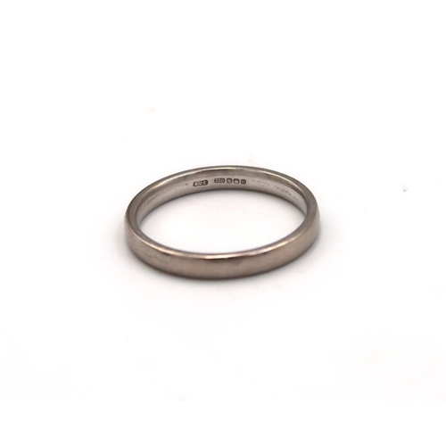  An 18ct white gold marked .750 wedding band, size L, 2.6 grams