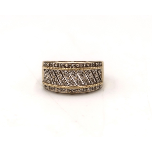  A 9ct gold bi colour band dress ring with single cut diamond highlights. Size R 1/2. Weight 5.35 gra... 