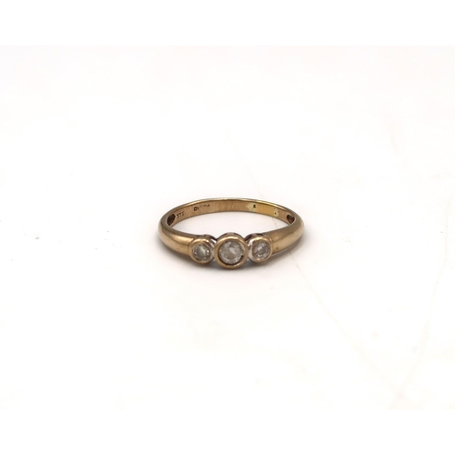  A 9ct gold brilliant cut diamond three stone ring. Estimated total weight 0.35ct, G/H colour, I1/I2 ... 